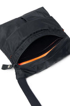 Black bag with orange interior on a white background