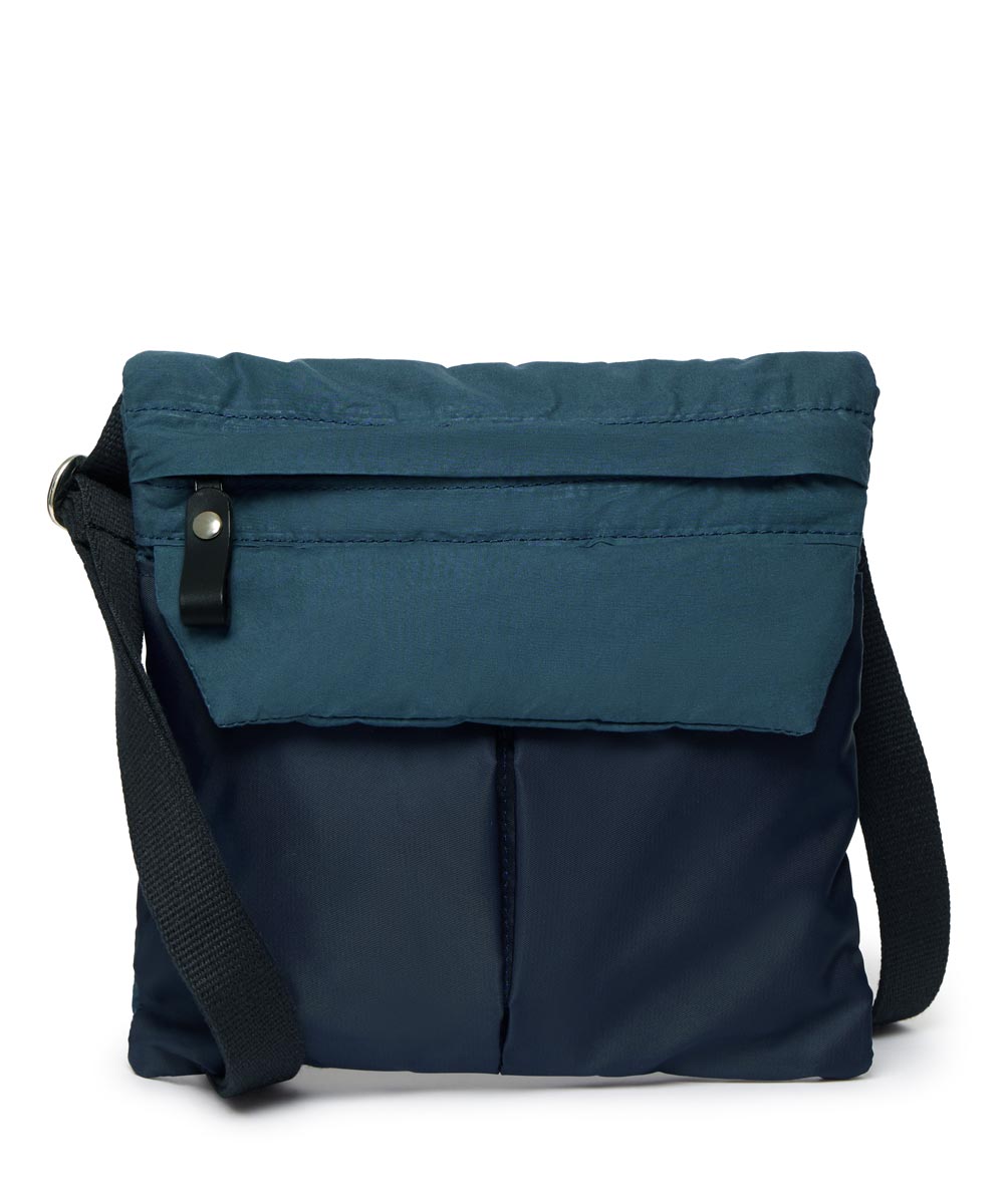 Navy crossbody bag with a black strap on a white background
