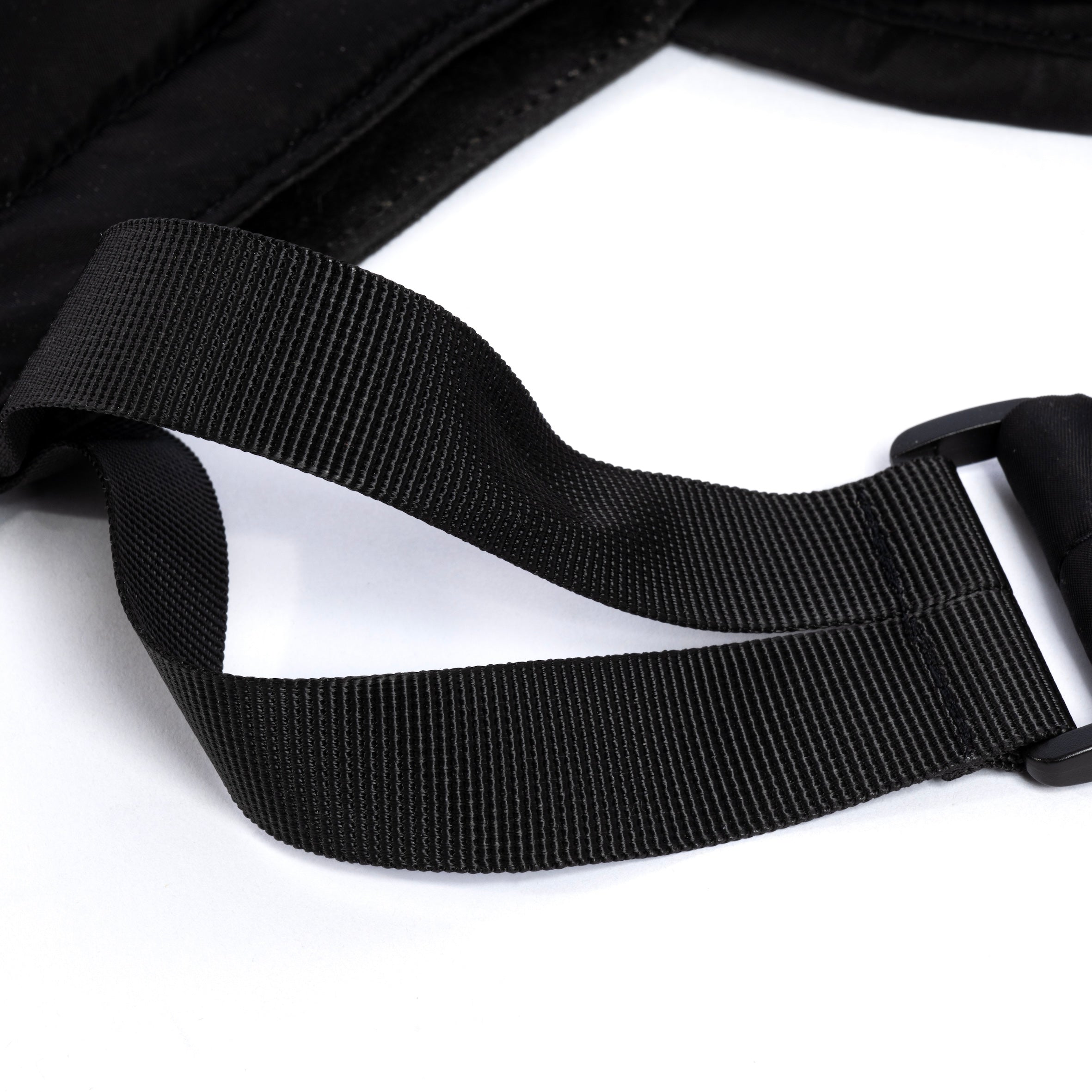 Black medium size tote bag showing strap detail on white background