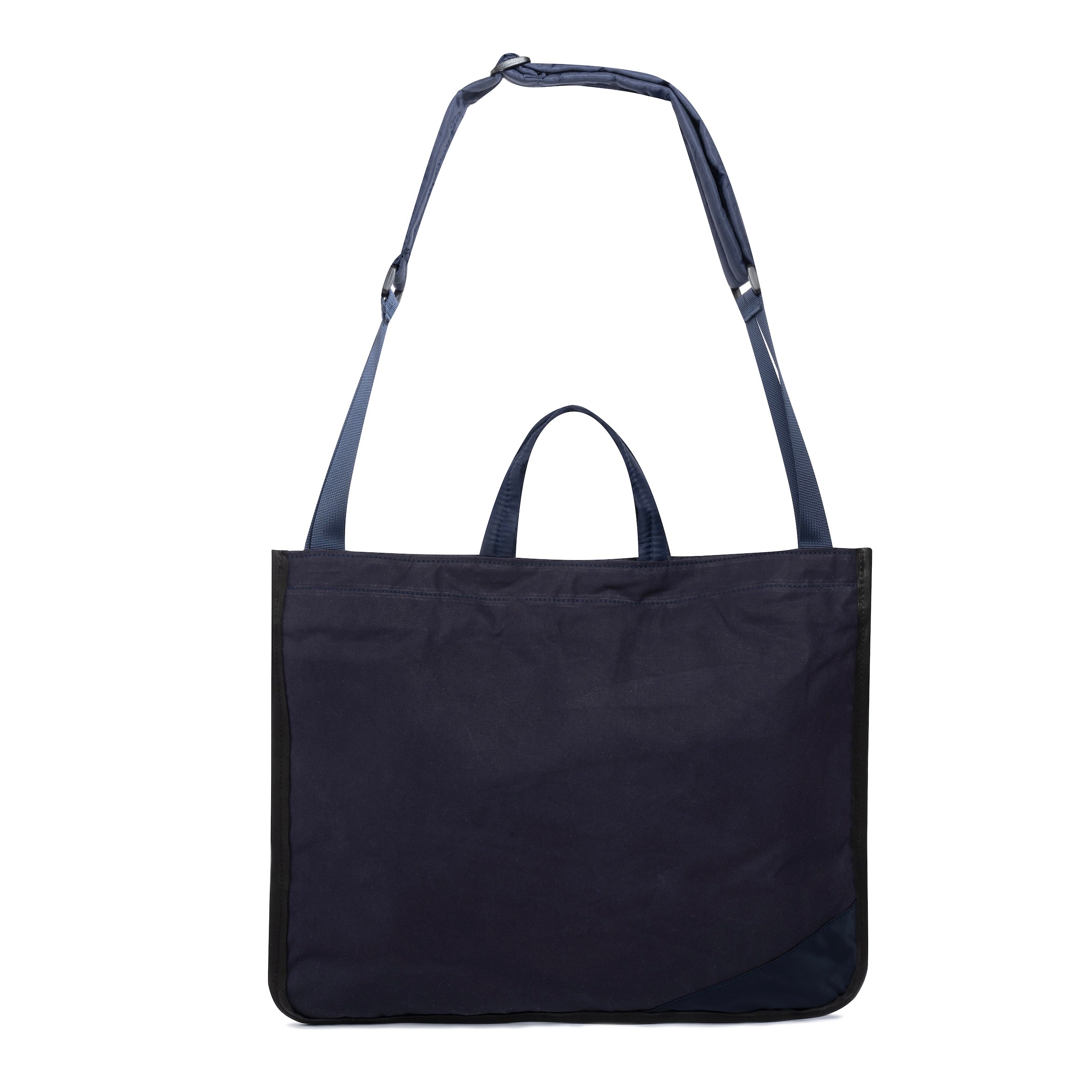 Navy blue medium size tote bag with shoulder strap and Minnessak logo on white background