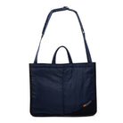 Navy blue medium size tote bag with shoulder strap and Minnessak logo on white background