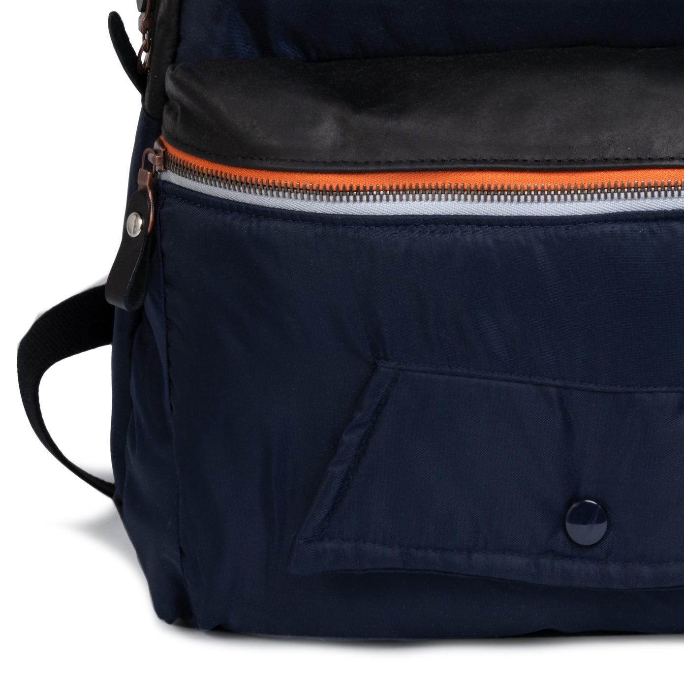 Navy blue backpack with orange zipper on a white background