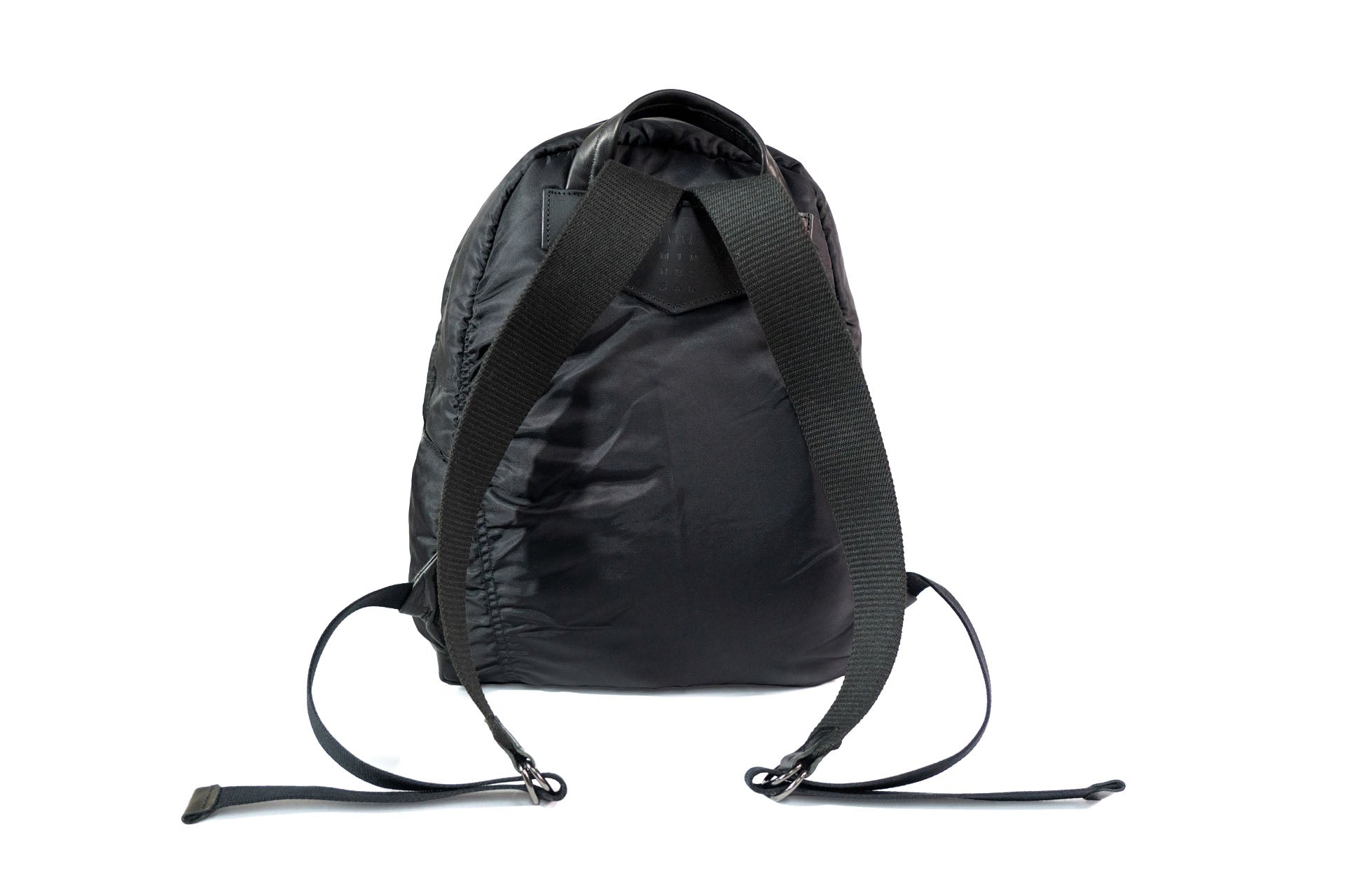 Black backpack on a white background