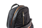 Black backpack with orange zipper on a white background