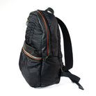 Black backpack with orange zippers on a white background
