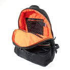 Black backpack with orange interior on a white background