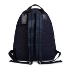 Navy backpack with visible zippers on a white background