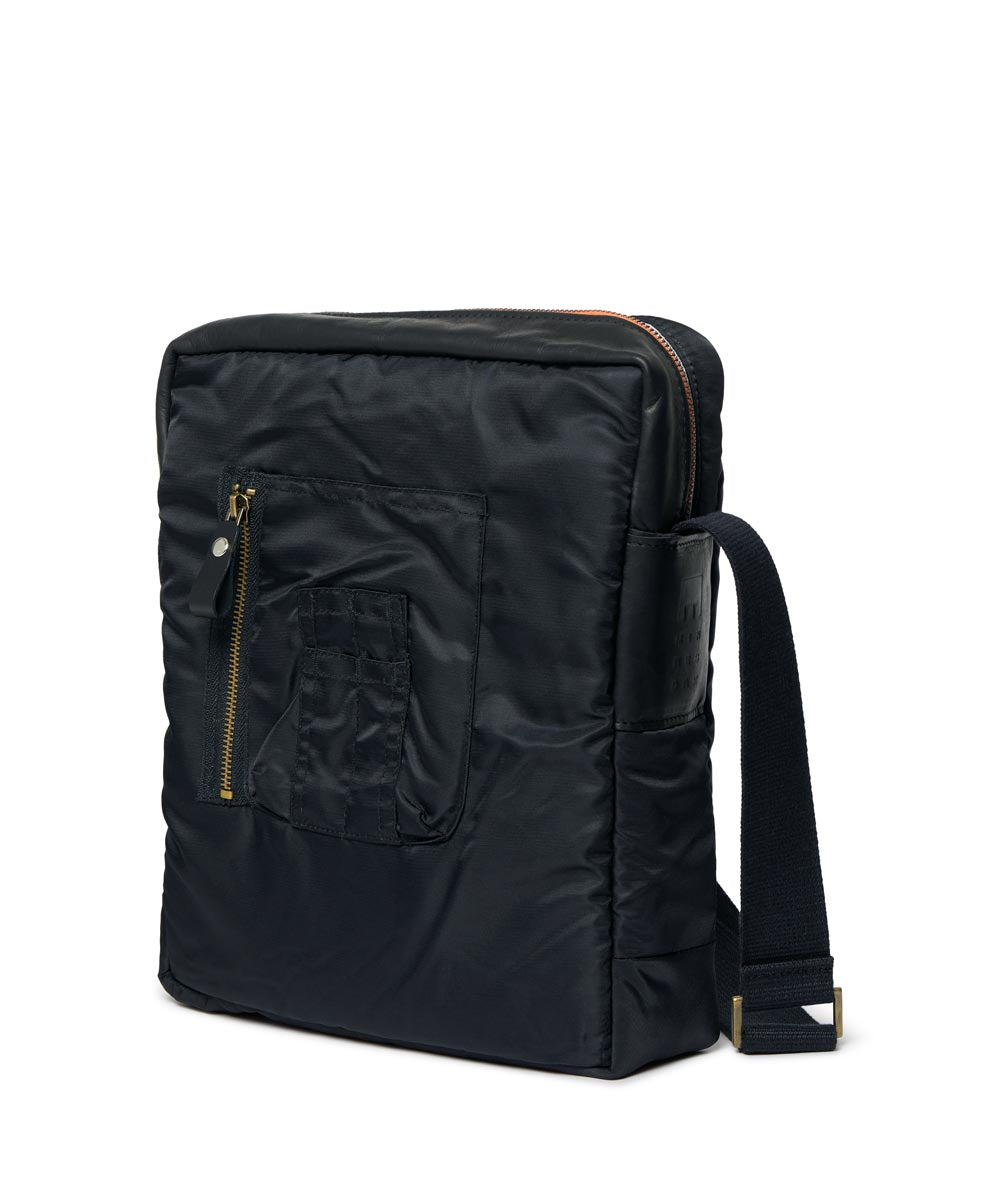 Black backpack with a visible brand logo on a white background