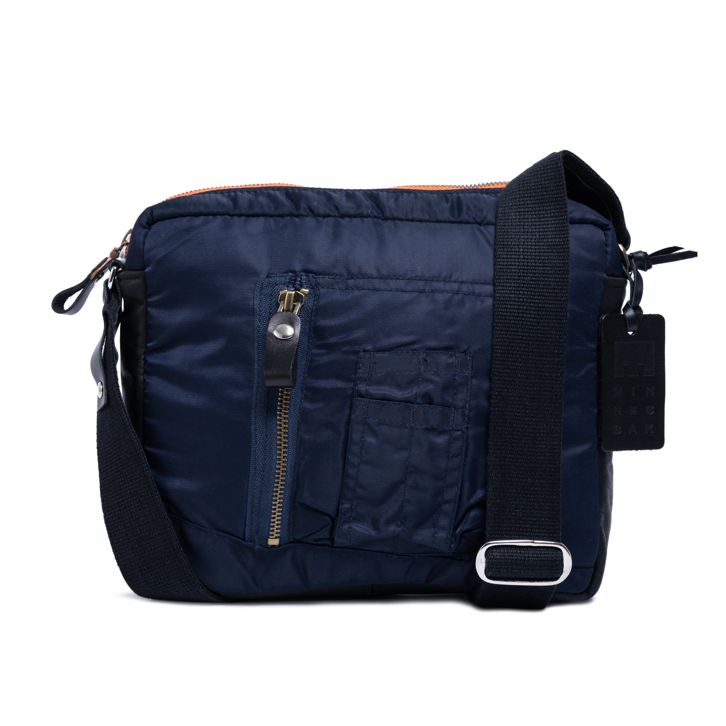 Navy blue shoulder bag with black strap on a white background