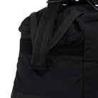 Black Weekender/Gym bag showing strap detail on white background