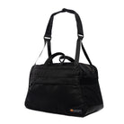 Black Weekender/Gym bag side view with strap and MInnessak logo on white background