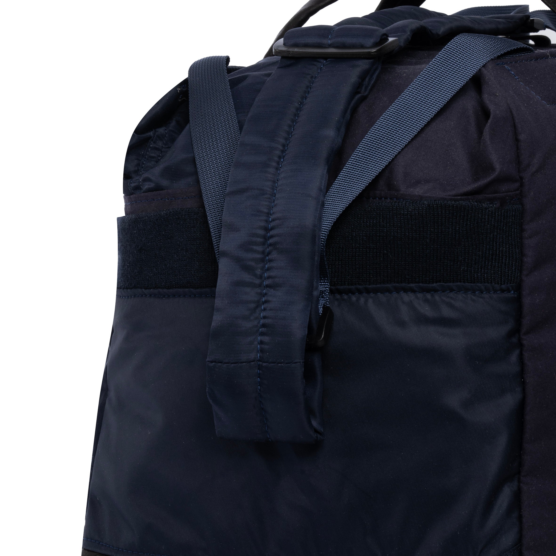 Navy Weekender/Gym bag showing strap detail on white background