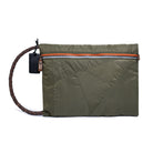 Olive pouch with orange zipper and a strapped crossbody on a white background