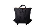 Black Back Up/26 sustainable backpack handmade from repurposed MA-1 flight jacket material with adjustable, quilted shoulder straps and vintage Italian leather details.