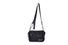 Black Just Flight [Small], small, sustainable utility crossbody bag, handmade in London from repurposed MA-1 flight jackets and deadstock waxed cotton material, with two zip compartments.