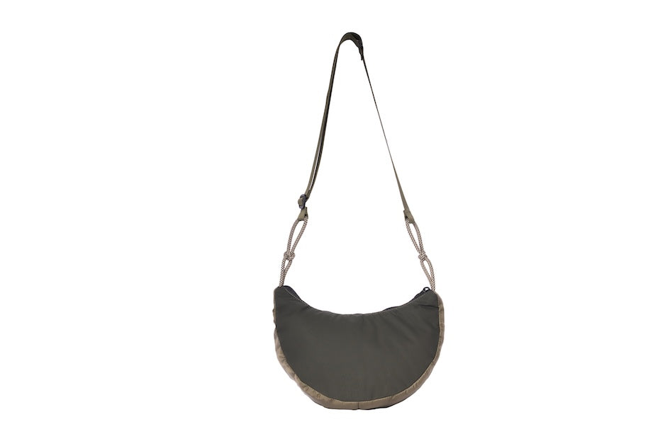 Olive Boat Small sustainable crescent crossbody bag handmade from deadstock Halley Stevensons dry waxed cotton material with adjustable shoulder strap. Back 