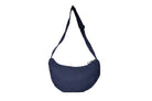 Navy Boat [Medium] crescent crossbody bag with adjustable strap, handmade from repurposed MA-1 flight jacket material and deadstock Halley Stevensons dry waxed cotton material. Back