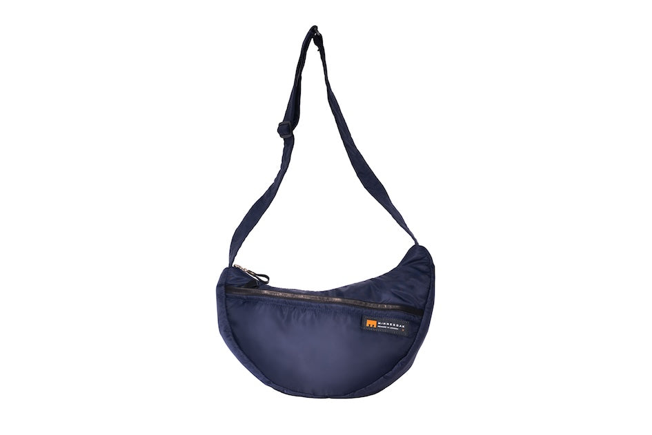 Navy Boat [Medium] crescent crossbody bag with adjustable strap and front zip pocket, handmade from repurposed MA-1 flight jacket material. Front