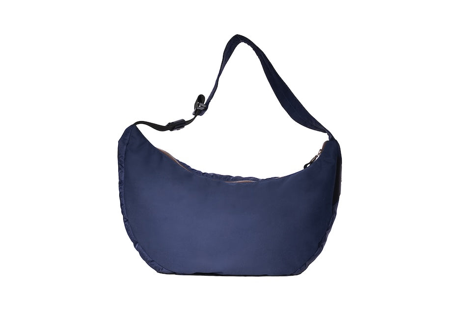 Navy Boat Large, back, sustainable crossbody bag handmade from deadstock Halley Stevensons dry waxed cotton material with adjustable strap.