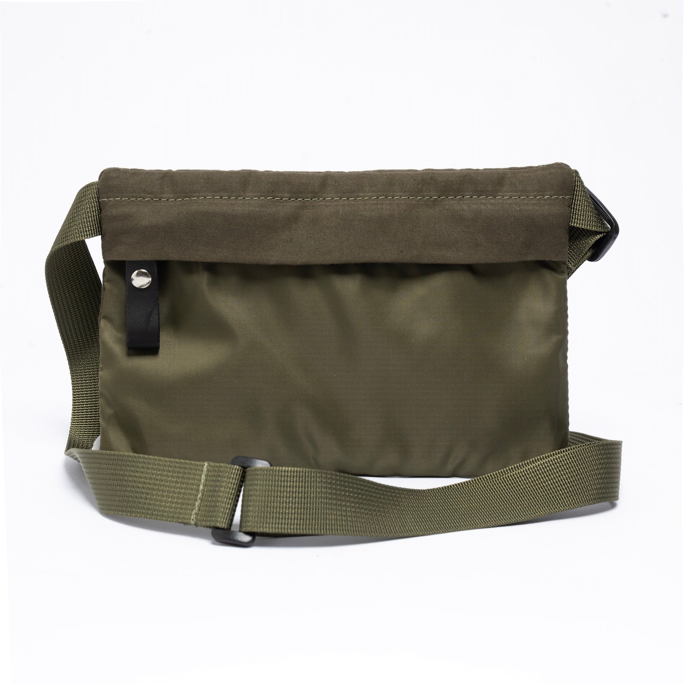 Small cross body bag in olive on a white background