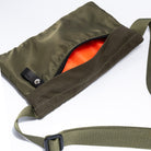Small cross body bag in Olive on a white background