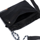 Black drawstring bag with a strap on a white background