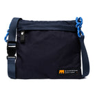 Black bag with blue straps and Minnessak label on a white background