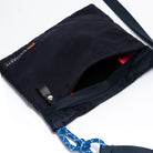 Black bag with a blue rope handle on a white background