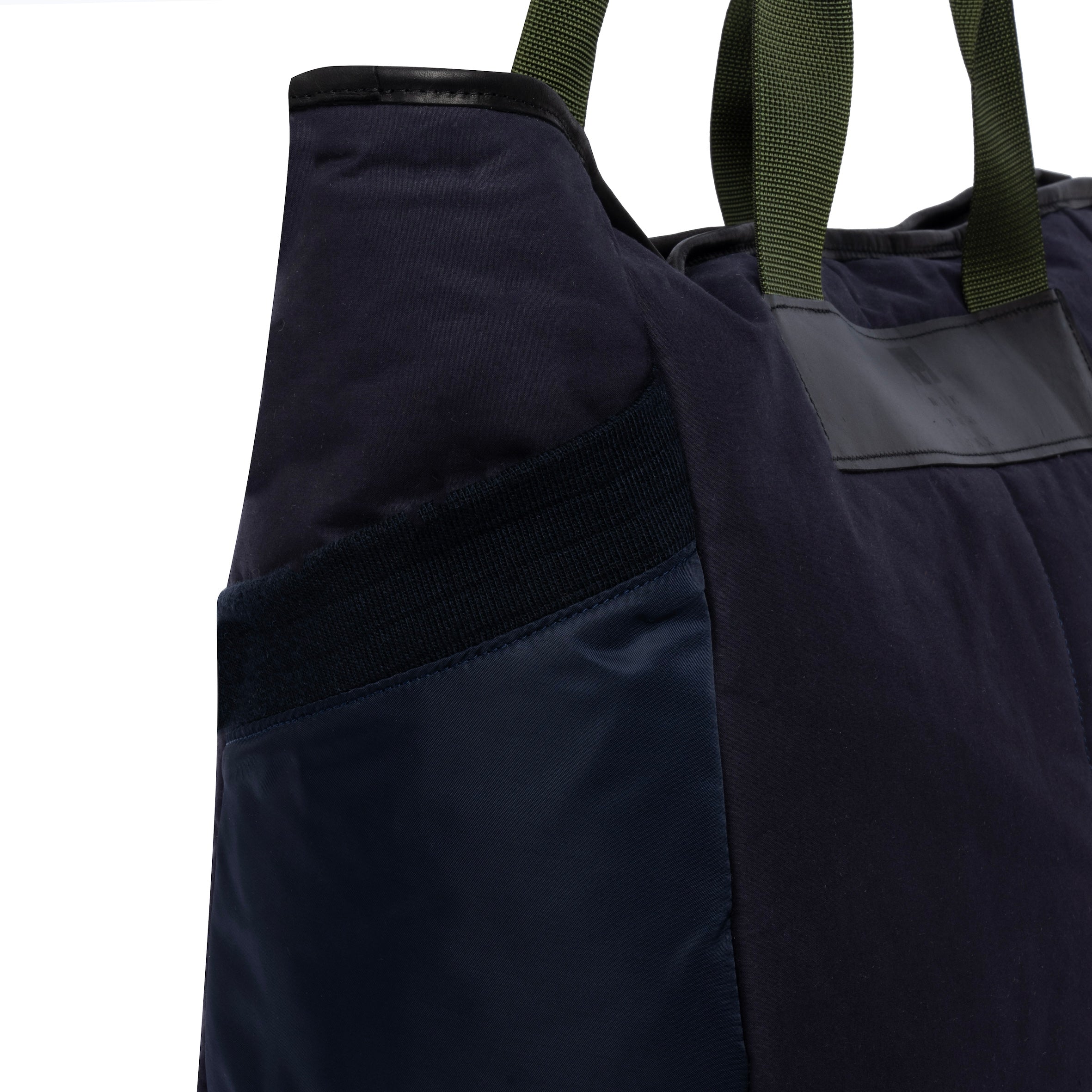 Large navy tote bag pocket detail on white background