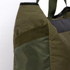 Large olive tote bag pocket detail on white background